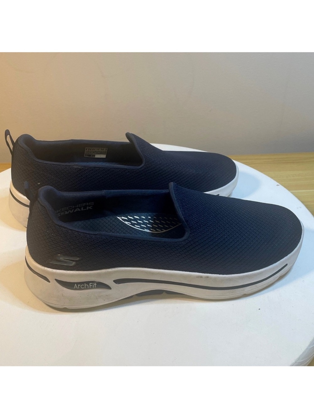 Skechers Arch Fit Slip-On Sneakers in Navy and White